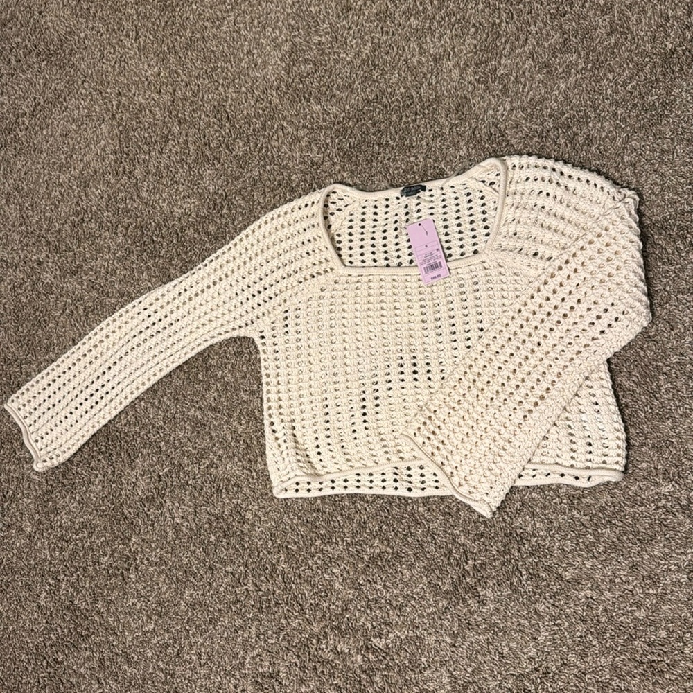 Wild fable sweater new with tags. Cream


Cover up, crochet.